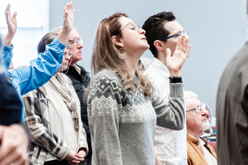 People worshipping at church